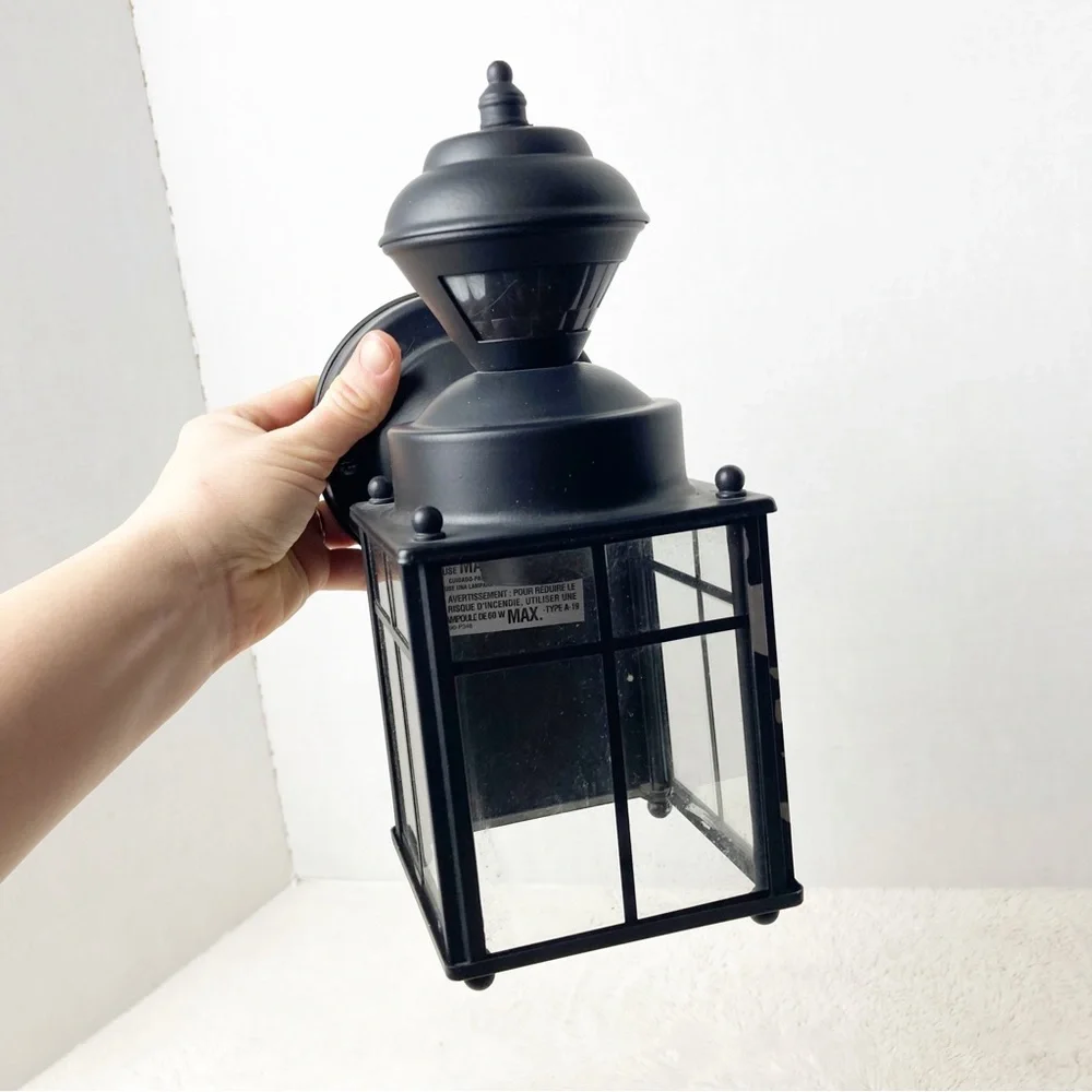 Black outdoor motion light sconce